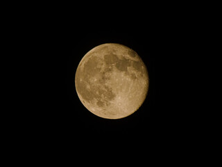 Full moon with visible craters and shadows, moonlight, circle moon phase with black background,...