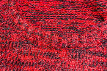 Textura o fondo de tejido de jersey rojo y negro con cuello