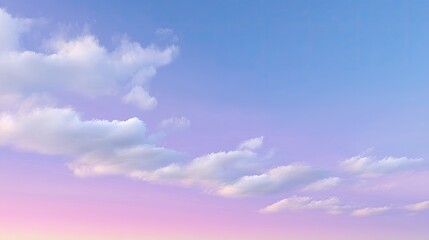 Fototapeta premium Serene Sky with Soft Clouds Above a Gradient Horizon at Dusk, Capturing the Tranquility and Beauty of a Colorful Twilight Sky