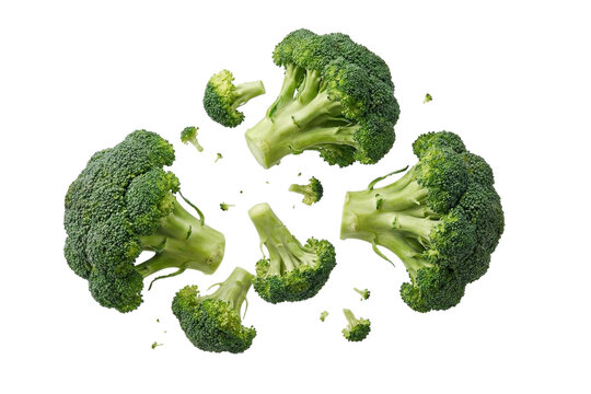 Vibrant fresh green broccoli florets scattered and floating on a clean white background