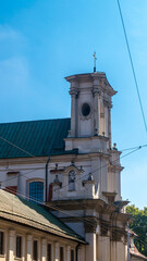 Basilica of the Holy Trinity. Old basilica on a sunny day against a blue sky