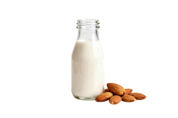 Bottle of almond milk with almonds beside it