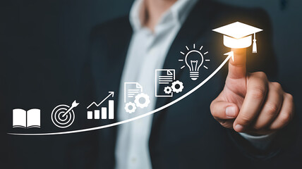 Businessman points to education icons symbolizing success growth and innovation in learning.