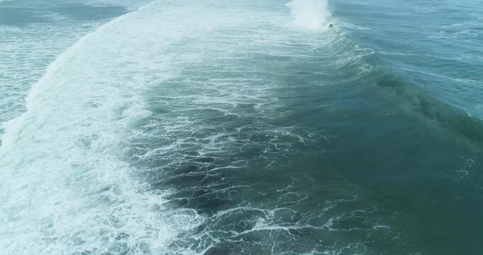 Aerial view of crashing ocean wave The Concept of Power