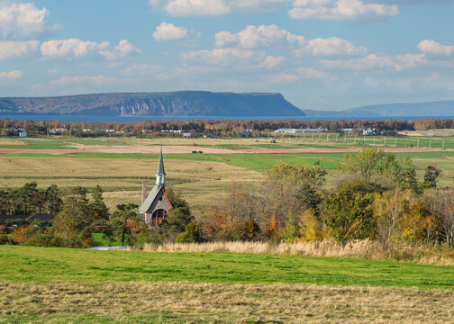 View of Cape Blomidon and rural farmland in Nova Scotia's Annapolis Valley.