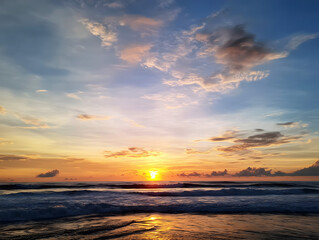 Golden Sunset over Ocean Waves