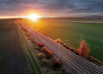 View of railroad tracks during sunset