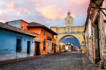 The Santa Catalina arch in Antigua Guatemala city, Guatemala, on dramatic sunrise