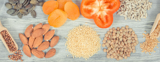 Various nutritious products or ingredients containing vitamins and minerals for healthy and lush hair