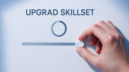 Upgrad skillset concept with hand adjusting slider to represent reskilling and training for career development and lifelong learning in professional growth and digital education