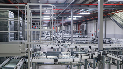 packing line in a logistics warehouse. conveyor belt in a modern production line