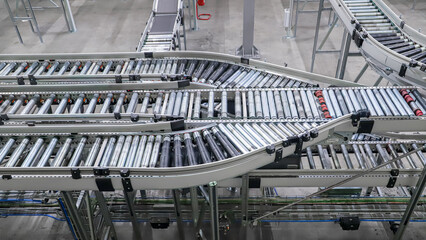 packing line in a logistics warehouse. conveyor belt in a modern production line
