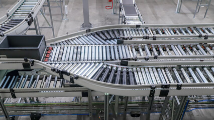 packing line in a logistics warehouse. conveyor belt in a modern production line