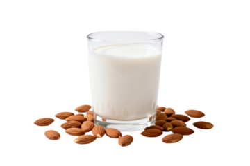 A glass of almond milk with almonds around it
