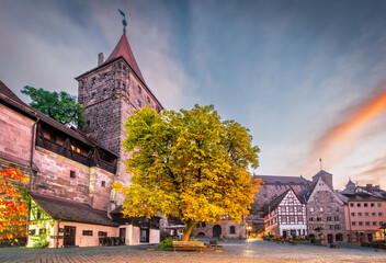 Nuremberg, Germany. Tiergartnertor, historical Kaiserburg, morning twilight.