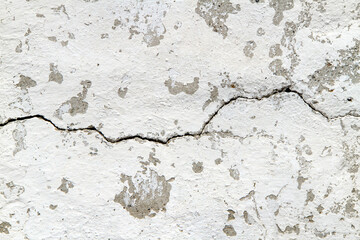 Horizontal crack on an old plastered wall