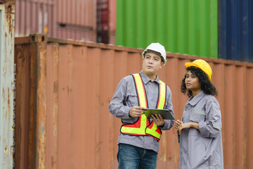 Workers Inspecting Cargo Container and Supply Chain Management, Logistics Engineers Team Using Digital Tablet for Inventory Check at Shipping Port