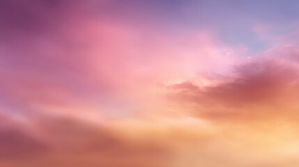 Fototapeta premium Soft pastel sky at dawn with gentle clouds in shades of pink, purple, and orange creating a serene and calming atmosphere for nature lovers