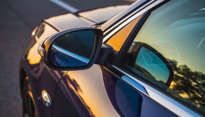 Fototapeta premium Close-Up Car Side Mirror with Reflection