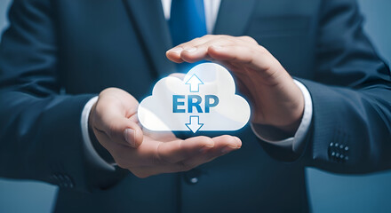 Businessman carefully holding a glowing cloud icon with the letters erp and up down arrows symbolizing secure data transfer and enterprise resource planning management