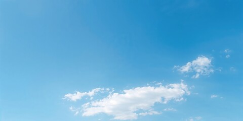 Fototapeta premium Clear blue sky with few clouds, suitable for outdoor relaxation or weather observation