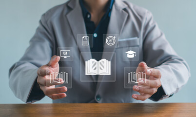 Business professional presenting digital education and e-learning concept with virtual book icons, online training, knowledge sharing, education technology and modern learning interface.