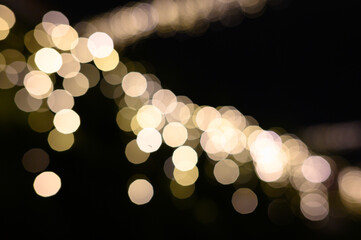 Blurry defocused lights in night time. Blurred background.
