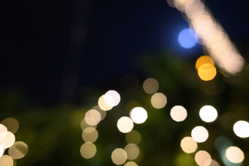 Blurry defocused lights in night time. Blurred background.