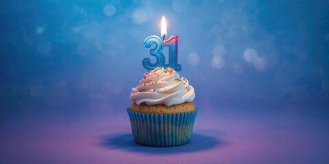 Cupcake with birthday candle number 31 for celebration card, highlighting festive dessert presentation