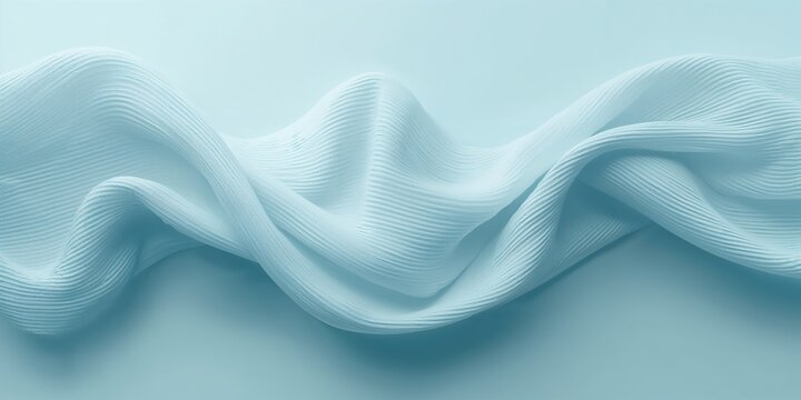 Detailed view of soft ribbed fabric surface with gentle folds and shadows, used as a fashion or textile background