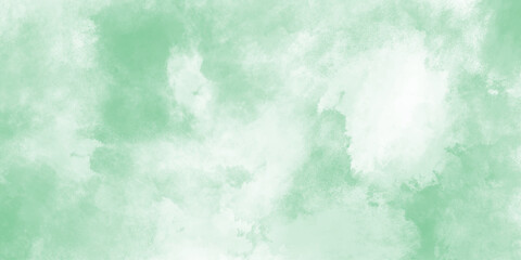 Green watercolor background with marbled grunge texture and color splash design,  Light green background. White a Christmas green backgrounds or papernd green watercolor grunge texture background. Sky