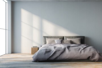 Minimalist bedroom with large window and sunlit wall.