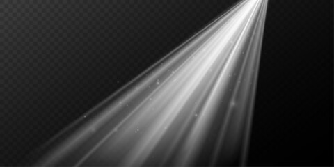 Abstract radiant rays of light with twinkling sparkling particles.