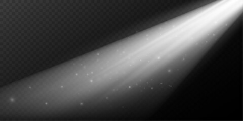 Radiant rays of light with sparkling particles floating in space.