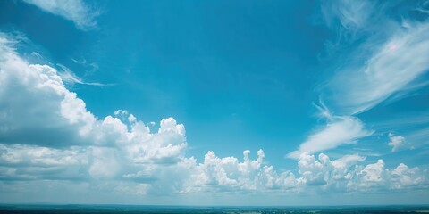 Obraz premium Blue sky and clouds abstract background, suitable for text overlay and layout design, Earth Day