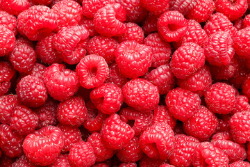 Fresh ripe raspberries as background, top view