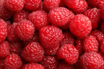 Fresh ripe raspberries as background, closeup view