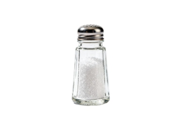 Glass salt shaker filled with white salt for seasoning