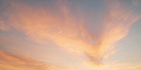 Obraz premium Soft gradient sky with orange and gold clouds, suitable for background use, natural beauty