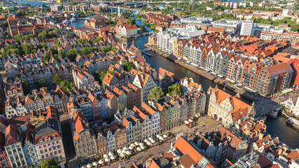 Aerial view of old town of Gdansk with colorful buildings, riverside architecture and urban scenery.