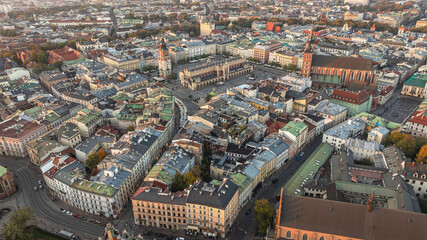 Aerial view of Krakow Old Town Square with St. Mary's Basilica and historic European architecture.