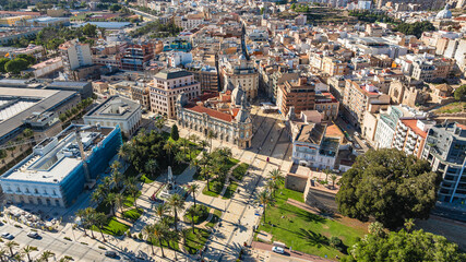 Santa Lucia in Cartagena, Spain, historic buildings, palm trees and Mediterranean urban landscape.