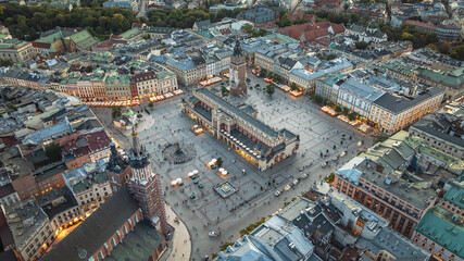 Dron view of Krakow s Main Market Square with Cloth Hall, Town Hall Tower and historic architecture.