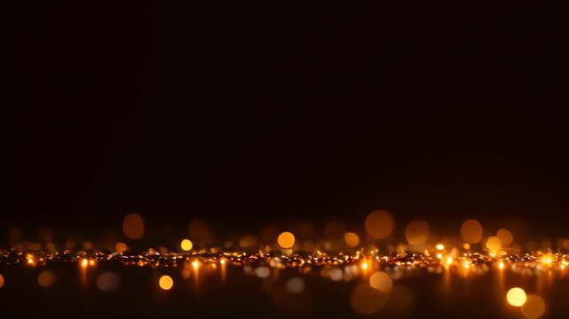 Black background with a lot of gold lights