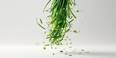 Fresh chopped green onions suspended in air, used as a garnish or ingredient in cooking