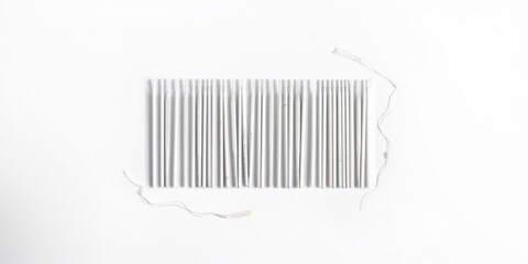 White dental toothpicks with dental floss on a white background, oral hygiene tools