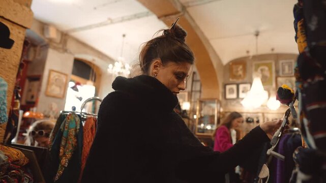 caucasian woman tourist browsing accessories with friend
