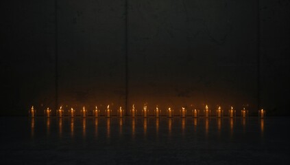 Dark scene with lit candles, symbolizing mourning and loss, observance of Memorial Day