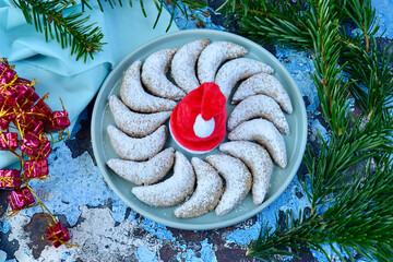 Vanillekipferl, traditional German Christmas cookies. Blue background