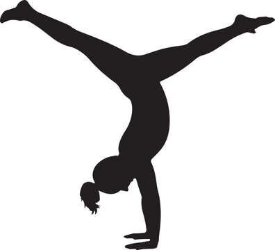 Silhouette of a female gymnast performing a handstand with legs spread wide